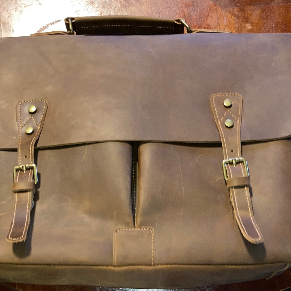 Brown oiled leather briefcase/messenger bag.